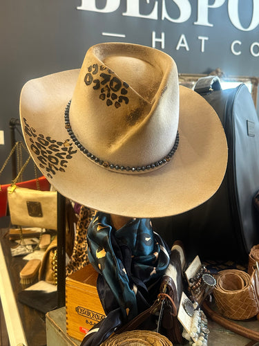 Distressed Rowan with leopard branding