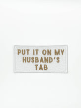 Load image into Gallery viewer, Put It On My Husband's Tab White Iron-On Patch Happy Hour